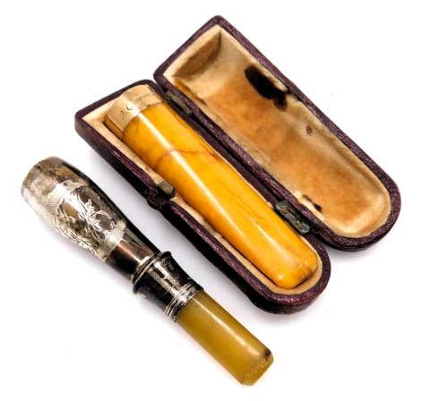 A Victorian amber and gold mounted cheroot holder, cased, Birmingham 1896, together with a sliver plated cheroot holder. (2)