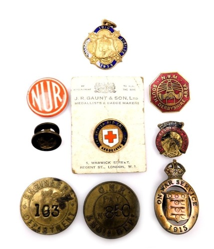 Two railway company engineering pay department tokens, for LNER and GNR, a Navies Union lapel badge, NUM South Derbyshire area badge, NUR badge, Health & Strength League badge, British Red Cross Society Associate badge, WWI 1915 War Service lapel badge an