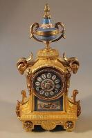 A late 19thC French gilt metal eight day mantel clock