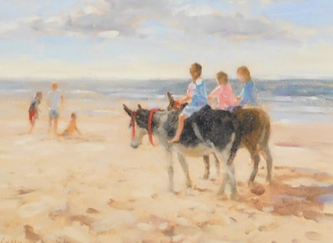 Leslie Stone (British, b.1957). Children riding donkeys on a sandy beach, oil on board, signed, 14cm x 19.5cm.