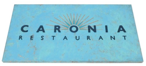 A Caronia restaurant sign, painted in blue on copper, 56cm x 110cm.