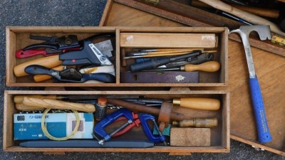 A carpenter's tool chest, the drop front opening to reveal three drawers and a recess, enclosing various tools, 63cm wide. - 2