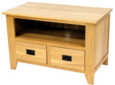 A light oak television cabinet, the rectangular top above a recess and two drawers, on stiles, 93cm wide.