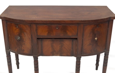 A George III mahogany bowfront sideboard, with cellaret drawer, central frieze drawer and concealed drawer, with ebonised ring turned legs, 92cm high, 122cm wide, 54cm deep. - 3