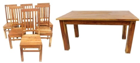 A mango wood dining table and chairs, comprising a four plank rectangular table, raised on square legs, 78cm high, 150.5cm wide, 92cm deep, together with six single dining chairs, with solid seats.