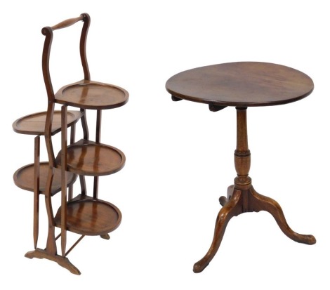 An Edwardian mahogany five tier folding cake stand, 89.5cm high, together with a George III mahogany tilt top occasional table, raised on three cabriole legs, 74.5cm high, 57.5cm wide.