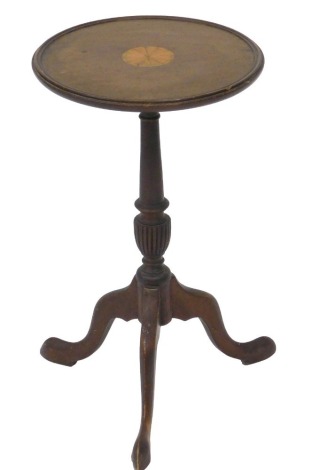 An Edwardian mahogany wine table, with paterae inlay, raised on a turned and fluted column over three cabriole legs, 48cm high, 28cm wide.