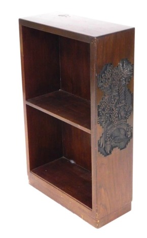 A Chinese hardwood open bookcase, with carved sides, having two shelves, on a plinth base, 76.5cm high, 46cm, 20cm.