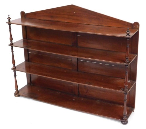 A Victorian mahogany whatnot, with a triangular pediment, and four shelves, raised on turned supports, on bun feet, 92cm high, 118cm wide, 26cm deep.