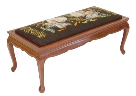 A Georgian style mahogany duet stool, with a drop in removable seat, decorated with doves, pigeons and ferns, raised on cabriole legs, 38cm high, 101.5cm wide, 46cm deep.