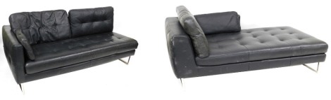 A Dwell black leatherette upholstered corner settee, 246cm wide.