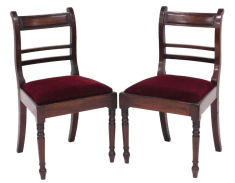 A pair of Regency mahogany bar back dining chairs.