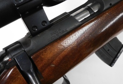 By Tender. A Czech CZ452-2E ZKM .22 rifle, serial number 537079, with a silencer, and a Tasco Golden Antler gun scope, barrel 72.5cm long, with bag. NB. A current valid Firearms Certificate is required to view or purchase this lot. Tender bids must be su - 6