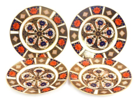 Four Royal Crown Derby porcelain plates decorated in the Old Imari pattern, 1128, red printed marks, 18cm diameter.