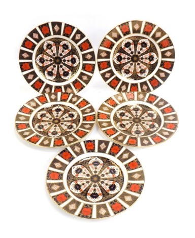 Five Royal Crown Derby porcelain plates decorated in the Old Imari pattern, 1128, red printed marks, 23cm diameter.