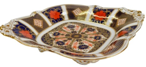 A Royal Crown Derby porcelain dish decorated in the Old Imari pattern, of twin handled square form, 1128, red printed marks, 23cm wide.