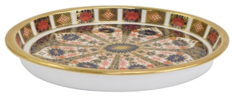 A Royal Crown Derby porcelain dish decorated in the Old Imari pattern, of oval form, 1128, red printed marks, 19.5cm wide.