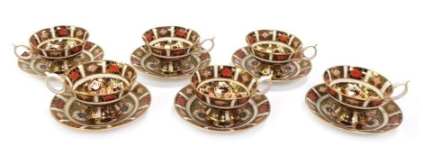 A set of six Royal Crown Derby porcelain teacups and saucers decorated in the Old Imari pattern, 1128, red printed marks.