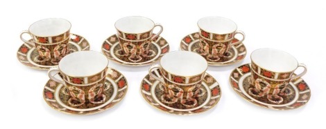 A set of six Royal Crown Derby porcelain teacups and saucers decorated in the Old Imari pattern, 1128, red printed marks.