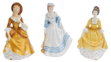 Three Royal Doulton porcelain figures, modelled as Sandra HN2275, Coralie HN2307 and Summertime HN3137.