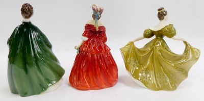 Three Royal Doulton porcelain figures, modelled as Premier HN2342, Lynn HN2329, and Vivienne HN2073. - 2