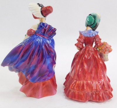 Two Royal Doulton porcelain figures, modelled as Lady Betty HN1967, 16cm high, and Lady April HN1958. - 2