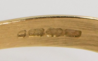 A 20thC 9ct gold signet ring, the square ring head with part scroll decoration and bearing the initial M, maker OPT, Birmingham, ring size T, 2.3g. - 2