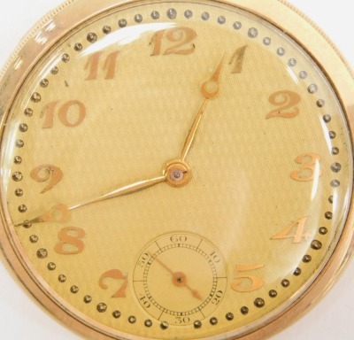 A 9ct gold pocket watch, open face, keyless wind, circular engine turned yellow dial bearing Arabic numerals, subsidiary seconds dial, 41.8g. - 2