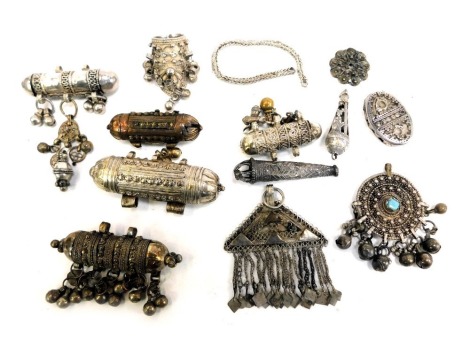 A group of Middle Eastern jewellery, comprising scroll pendants, pendants, some white metal, unmarked, etc.