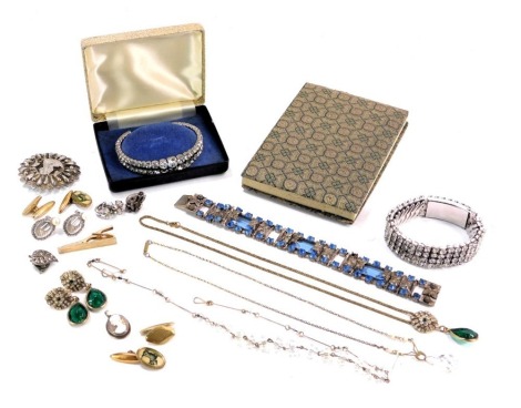 A collection of costume jewellery, comprising blue paste stone set bracelets, Eastern inspired brooch, drop earrings, marcasite leaf earrings, rice paper book, etc. (a quantity)