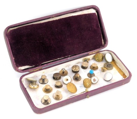 A presentation cased set of collar studs, mainly gold and silver plated, some stone set.