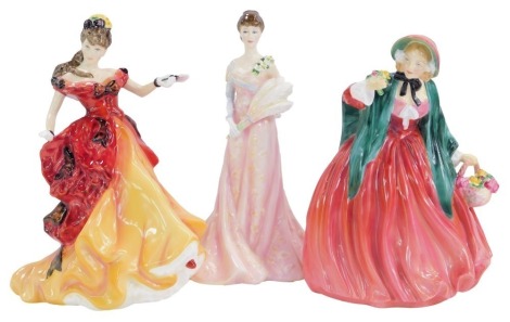 Three Royal Doulton porcelain figures, modelled as Figure of the Year 1966 Belle HN3703, Lady Charmian HN1949, and Lillie Langtry HN3820, limited edition number 108/5000.