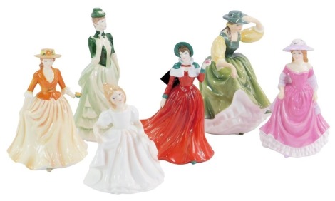 A group of Royal Doulton porcelain figures, comprising Buttercup HN2309, Autumn Stroll HN4588, Summer Breeze HN4587, Amanda HN2996, and Winter's Day HN4589, together with a further Coalport figure. (6)