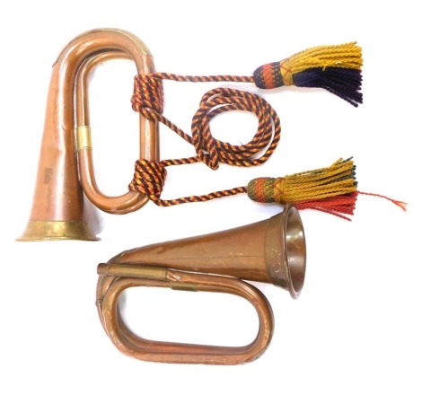 A Boosey and Hawkes Limited London England copper and brass bugle, for the Boys Brigade, with rope work embellishment, printed marks, 26cm long, together with a further bugle. (2)