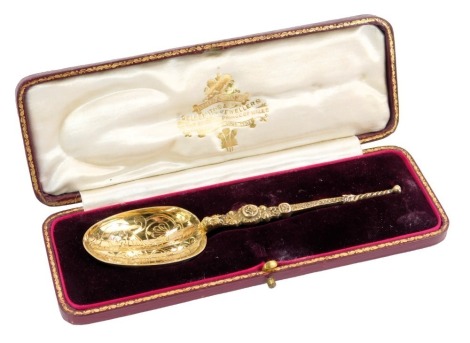 An Edward VII silver gilt copy of the Coronation Anointing spoon, cased, Reid and Sons, London 1910,1oz, in presentation case.