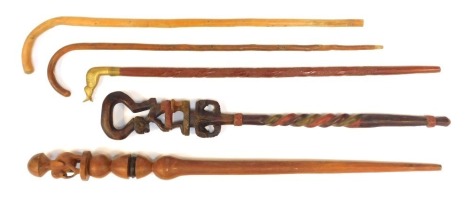 Five various walking canes, comprising an African walking cane with carved elephant top, 103cm long, brass duck handled walking cane, 91cm long, and three others. (5)