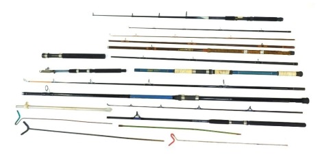 Various fishing rods and accessories, including an Okima Booster Beachcaster 360, an Extreme Match 12ft two-piece split cane fishing rod, a Superior rod. (a quantity)