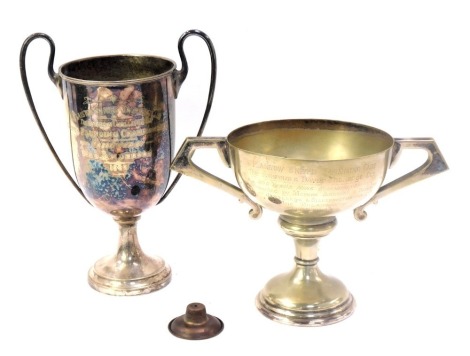 Two silver plated presentation cups, comprising the Plaistow United Swimming Club trophy for 1921, and the Plaistow United Swimmer's Club 1922 twin handled trophy, lacking bases, 24cm and 18cm high. (2)