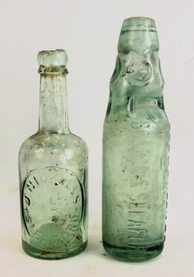 Two Lincolnshire related glass bottles, comprising Lee and Green Limited Boston and Sleaford, and a J Nickolls and Co of Sleaford, 23cm and 20cm high. (2) - 2