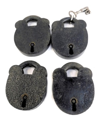 Four cast iron padlocks, 15cm high, and one key.