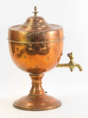 A 19thC brass and copper kettle, 33cm high, and a brass and copper samovar, 44cm high. (2) - 3