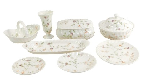 A group of Wedgwood porcelain Campion pattern table wares, comprising an oval tray, miniature bud vase, swing basket, two pin dishes, two jars and covers. (1 tray)