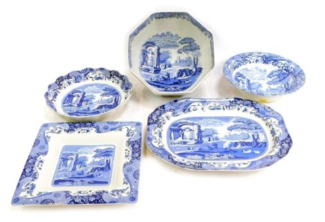 A group of Copeland Spode Italian pattern blue and white pottery, comprising an octagonal bowl, 25cm wide, a serving dish, 24cm wide, a fluted side dish, 25cm wide, a square cake plate, 25cm wide, and a rectangular server, 32cm wide. (5)