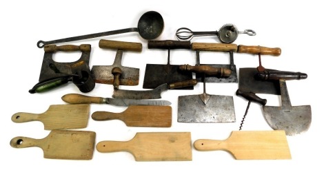 Kitchenalia, to include 19thC and later butter pats, vegetable slices, bean slices, whisk, etc. (1 tray)