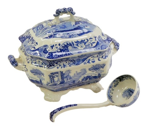 A Spode Italian pattern blue and white pottery soup tureen, cover and ladle, 23cm high, 34cm wide.