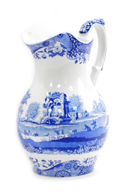 A Spode pottery Italian pattern blue and white water jug, 32cm high.