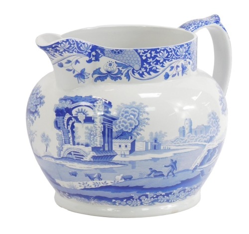 A Spode pottery Italian pattern blue and white water jug, 25cm high.