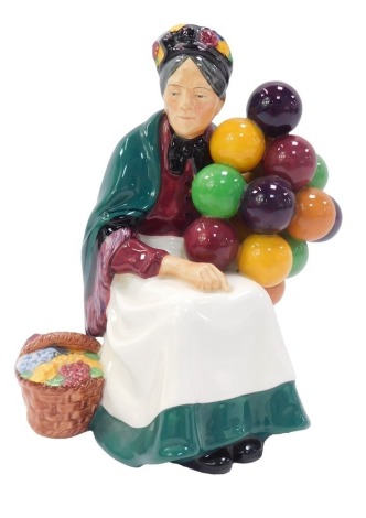 A Royal Doulton figure of The Old Balloon Seller, HN1315, 20cm high.