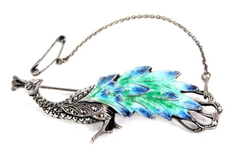 A marcasite and enamel peacock brooch, the blue and green enamel set with marcasite and single pin back, with safety chain white metal stamped 925, 6cm wide, 10.7g all in, boxed.