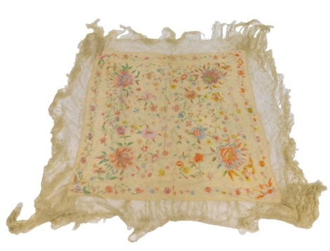 A 20thC silk shawl, with embroidered floral decoration, with pierced and tasselled border, the design 110cm x 100cm.